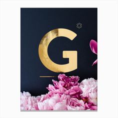 the letter g is surrounded by pink flowers and gold foil on a black background with purple petals