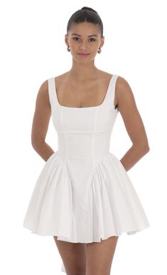 Designed in Los Angeles- Mini Length- Zipper and back tie closure- Fully lined- Made in cotton fabric- Hand wash coldModel is wearing a size small that measures 31in/79cm in lengthSlight modifications might be made to improve garment quality.Handling the garments with care, hand-washing and air-drying is strongly recommended. White Grad Dress, Italian Style Dress, Confirmation Dresses, Short Dress White, Graduation Dresses, Casual Day Dresses, Mini Dress Fashion, Mini Sundress, Arm Sleeves