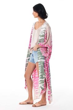 Make a statement while floating by the pool, the Koa Kimono is versatile in how to wear. Loosely knot the front or allow to drape open, style over swimwear or your favourite fitted ensemble. | Oversized kimono top| Tie up front option | 53% Viscose // 47% Rayon | Hand wash cold Born on the streets of LA ♡ Oversized Kimono, Blue Wine Glasses, Sweater Jumpsuit, Sweater Tank Top, Active Wear Tops, The Pool, Jeans Dress, The Streets, Summer Looks