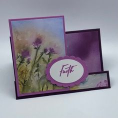 two cards with flowers on them, one is purple and the other has white lettering