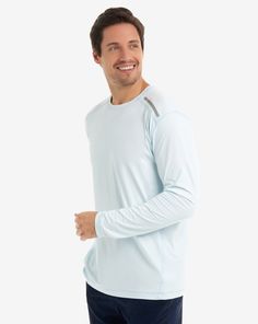 MEN'S LONG SLEEVE JET TEE The BloqUV 50+ UPF men’s sun protection shirts is sun protection to be worn alone, as a base layer, swim shirt, rash guard or sun shirt. The sun protection sleeves offer comfort, freedom of movement and is perfect for running, biking, swimming, paddle boarding, fishing, boating, skiing, pickle ball, beach tennis, tennis, golf, working out or just looking sharp at leisure. This style is a favorite in mens sun protection shirts! Relaxed fit Reflective trim at shoulders to boost low light visibility Style: #12002 Swim Shirt, Pickle Ball, Beach Tennis, Sun Shirt, Swim Shirts, Light Turquoise, Baby Wipes, Performance Outfit, Low Light