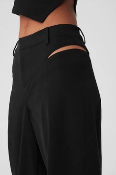 High-Waist Risk Taker Trouser - Black | Alo Yoga Alo Trousers, Alo Yoga High Waist Activewear, Edgy Wide Leg Pants For Night Out, Chic Cutout Bottoms For Spring, Modern Asymmetrical Bottoms For Night Out, Modern Wide Leg Pants For Night Out, Modern Asymmetrical Black Bottoms, Sporty Black Alo Yoga Bottoms, Alo Yoga Black Stretch Bottoms