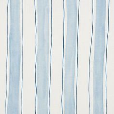 a blue and white striped wallpaper with vertical lines on the top half of it