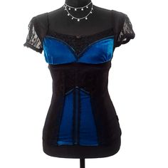 A Relic Of The Golden Age Of Y2k Mallgoths. Size Small Vintage Tripp Nyc Top. Cotton Blend, Black And Teal Or Peacock Blue, Lace, Velvet, Cotton Fabric Mix. In Excellent Condition. Size Small 16" Flat Across The Chest 22" In Length. Steampunk Fitted Corset For Night Out, Black Alternative Fitted Corset, Fitted Alternative Fashion Corset, Alternative Fitted Corset For Cosplay, Black Fitted Alternative Style Corset, Fitted Black Alternative Corset, Fitted Black Alternative Style Corset, Fitted Alternative Style Corset For Cosplay, Gothic Corset For Halloween Night Out