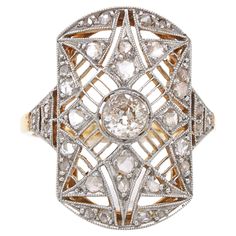 An old European cut and rose cut diamond ring in yellow gold and platinum, ca. 1890s. The ring is beautifully designed as a star emblem in a filigree milgrain platinum setting. The backside of the ring is in yellow gold. The ring is marked AS and has a maker mark. Ring size 54 (US 7) - resizing possible. Gold Fringe Necklace, Diamond Drop Pendant, Rose Cut Diamond Ring, Rosecut Diamond Ring, Rainbow Sapphires, Antique Diamond Rings, Diamond Star, Art Deco Earrings, European Cut Diamonds