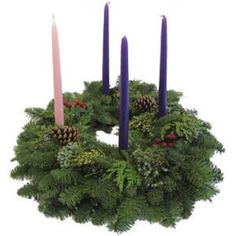 "Advent wreaths are used to celebrate the Advent season which begins on the 4th Sunday before Christmas Day.  Four symbolic candles are added to the wreaths.  This fresh wreath for Advent is handcrafted from fresh evergreens.  We add berries and pinecones as well.  The CANDLES ARE NOT INCLUDED.  There are metal cups where you can add your own 3/4\" flameless candles.  We suggest non-flame candles for safety.   Please take a look at our other styles of wreaths.  We offer a variety of bows and mat Christmas Garland With Candle Holder, Swedish Advent Wreath, Advent Wreath Candles Not On The High Street, Advent Wreath Lights4fun, Luxury Advent Wreath, Advent Candle Wreath Vine, Presbyterian Advent Wreath, Christmas Wreaths Candles For Windows, Wooden Advent Wreath Candle Holders