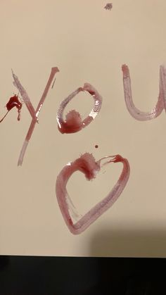 the word joy written in pink paint on a piece of paper that says you love