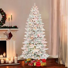 a white christmas tree in a living room