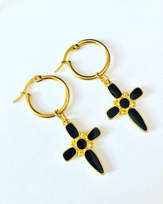 - Stainless steel hoop earrings , black cross earrings, the cross charm is 24K gold plated - The diameter of earrings is 2 cm (0,8 inches), charm length is 3.5 cm (1,4 inches) - Colors may appear slightly different on screen due to differences in resolution, brightness, and contrast JEWELRY CARE - Keep jewelry dry - Take it off before taking shower, bath, swimming or exercising - Makeup, perfume, hairspray apply before wearing jewelry - Store your jewelry somewhere dry, not in the bathroom Handm Contrast Jewelry, Black Cross Earrings, Earrings Cross, Wearing Jewelry, Black Cross, Cross Earrings, Earrings Black, Black Earrings, Cross Charms