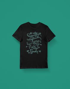 "\"It was always wise to be polite to books\" quote shirt inspired by A Sorcery of Thorns. Perfect for book lovers. * Fabric weight: 4.2 oz (142 g/m2) * Pre-shrunk fabric * Shoulder-to-shoulder taping * Side-seamed * Direct-to-Garment (DTG) printed *This item is made to order with DTG technology, due to this each shirt is slightly different, the placement of the image, the colors and size of the printing area might vary a little. *Each item might have minnor flaws like small speckles." Literary Black Cotton T-shirt, Black Literary Crew Neck T-shirt, Black Bookish T-shirt With Screen Print, Black Literary Top With Graphic Print, Black Literary T-shirt With Letter Print, A Sorcery Of Thorns, Sorcery Of Thorns, Quote Shirt, Shirts With Sayings