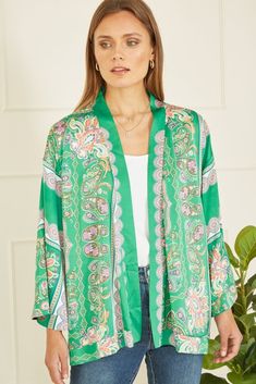 Mela Green Paisley Print Satin Kimono | Mela Patterned Kimono With Vibrant Print, Green V-neck Kimono For Spring, Spring Long Sleeve Kimono With Vibrant Print, Green Kimono With Vibrant Print For Summer, Casual Spring Paisley Print Kimono, Green V-neck Printed Kimono, Oversized Green Spring Kimono, Oversized Green Kimono For Spring, Green Oversized Kimono For Spring