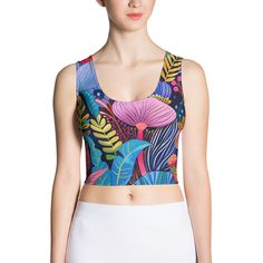 Look fabulous in an all-over printed, body-hugging crop top, now offering FREE SHIPPING to the US, Canada, EU, and UK! The artwork This artwork is a vivid and richly detailed depiction of a variety of African flowers, showcasing a tapestry of vibrant colors and intricate patterns. The piece features a dynamic assortment of floral elements, including large, bold blossoms and delicate foliage, all set against a deep blue background. The use of contrasting colors and stylized forms captures the lus Workspace Essentials, French Collection, African Flowers, Cropped Tops, Crop Tops Women, Crop Top, Spring Collection, Blue Backgrounds, Laptop Sleeves