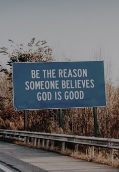 a blue sign that says be the reason someone believees god is god