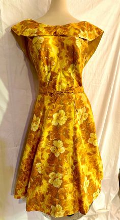 This beautiful vintage bombshell dress by Nani of Hawaii features a stunning Hawaiian hibiscus print.. The dress is made of cotton and has a chest size of 36 inches and a waist size of 26 inches. It is a day dress from the 1950s and is marked size 10 which correlates closer to a size 4 or 6 in todays sizes. The dress has a rockabilly look and a shoulder to shoulder measurement of 16 inches. The waist to hem measurement is 22 inches and the shoulder to hem measurement is 35 inches. Side zipper. This dress is perfect for anyone looking for a unique and beautiful vintage Hawaiian dress to add to their collection. Excellent condition. Please email with any questions or special requests. Free shipping in the United States. Two Piece Hawi Dress, Vintage Bombshell, Rockabilly Looks, Vintage Hawaiian Dress, Bombshell Dress, Hibiscus Print, Hawaiian Hibiscus, Hawaiian Outfit, Pin Up Dresses