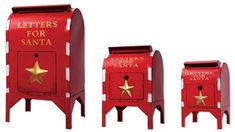 three red mailboxs with gold stars on the front and sides, one for santa