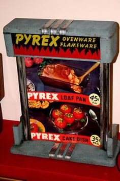 there is a sign that says pyrrex ovenware on the side of a table