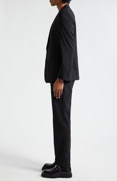 Precise pickstitching showcases the Italian fashion house's attention to detail on this suit tailored in the label's slim Martini fit from stretch wool. Jacket has notched lapels; four-button cuffs; chest welt pocket; front flap pockets; two interior pockets; back vent Pants have zip fly with hook-and-bar closure; front slant pockets; back button-welt pockets 98% wool, 2% elastane Dry clean Made in Italy Designer Clothing Fitted Suits With Concealed Placket For Tailoring, Timeless Fitted Suits With Concealed Placket, Fitted Tuxedo With Structured Boning For Workwear, Business Suit With Concealed Placket And Straight Hem, Fitted Tuxedo With Pressed Crease For Work, Modern Fitted Pantsuit With Notch Lapel, Modern Suits With Concealed Placket, Business Casual Suits With Concealed Placket And Straight Hem, Timeless Fitted Suit With Concealed Placket