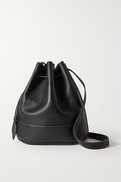 Hunting Season's bucket bag was designed with "clean lines and a timeless aesthetic" in mind. Handmade in Colombia from supple leather, it has plenty of room for your essentials and a drawstring top to keep everything secure. Black Bucket Bag, Black Bucket, Bucket Bags, Timeless Aesthetic, Drawstring Top, Hunting Season, Leather Bucket Bag, Leather Bucket, White Bag