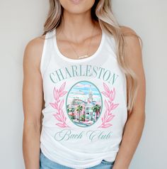 a woman wearing a white tank top with charleston beach club on the front and palm trees in the back