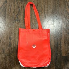 Lululemon Reusable Store Bag Small Size Snap Closure Red And White See Photo For Measurement Details Red Nylon Bag For The Gym, Red Nylon Gym Bag, Red Reusable Casual Bag, Red Casual Reusable Bag, Red Reusable Everyday Bag, Reusable Bags, Lululemon Athletica, Small Bags, Red And White