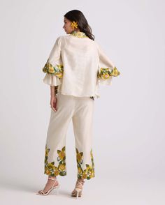 Elevate your style with this ivory chanderi pants, intricately detailed with sunflower threadwork and delicate beadwork. These pants exude sophistication and charm, offering a refined addition to your wardrobe. Sunflower Pants, International Style, Elevate Your Style, Bead Work, Your Style, Custom Sizing, Sunflower, Women Wear, Wardrobe