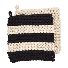 two black and white knitted pot holders