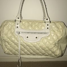 Balenciaga Vintage Off White Truffle Quilted Leather Matelasse Bubble Bag With Silver Hardware And Exquisite Stitching Details On The Handles. The Inside Has An Attached Leather Mirror That Attaches To The Bag, The Bag Is Rectangular In Shape. There Is Some Discoloration And Markings But In Overall Good Shape, Inside Lining Is Perfect. Originally Purchased At Barneys Ny, I Am Happy To Have Poshmark Authenticate For Any Serious Buyers. Balenciaga Shoulder Bag White, Balenciaga Mini City Bag, Balenciaga Classic City Bag, Balenciaga Mini City, Balenciaga Purse, Balenciaga Classic City, Balenciaga Wallet, Leather Mirror, Black Balenciaga