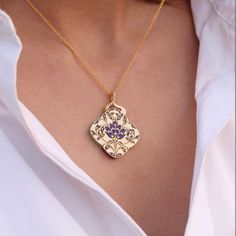 SHARP STYLE WHAT IT IS: This elegant pendant comes fitted with a 22K gold handmade cable chain and a lobster clasp. WHY IT’S SPECIAL: GOOD TO KNOW: 22K gold, natural brown diamonds 0.26 ct, rosecut diamonds 0.07 ct, Vitreous enamel. (18K lobster clasp) Pendant size approx. 17 mm; Chain length 16 inches. Pendants are available separately, price upon request. WHY WE LOVE AGARO: Elegant Medallion Diamond Necklace As Gift, Gold Diamond Necklace With Gemstone Pendant, Gold Diamond Pendant Necklace With Gemstone, Exquisite Gold Necklace With Large Pendant, Elegant Gold Diamond Necklace With Large Pendant, Yellow Gold Diamond Flower Pendant Necklace As Gift, Diamond Necklace With Large Pendant As Gift, Yellow Gold Diamond Necklace With Flower Pendant As Gift, Yellow Gold Diamond Necklace With Detachable Pendant For Gift