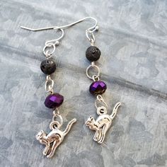 2½ Inch Long Silver Tone Metal Kangaroo Aromatherapy Earrings. These Fun Earrings Are Hand Crafted On Silver Tone Metal Findings With Black Lava Beads And Purple Recycled Crystals. $10.00 +S&H #Countrygypsyor Purple Metal Pierced Jewelry, Purple Pierced Metal Jewelry, Wedding Earrings Studs, Wedding Hoop, Pearl Drop Earrings Gold, Gold Bead Earrings, Wedding Studs, Crystal Heart Earrings, Lava Beads