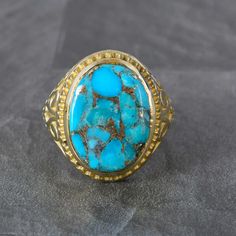 Gold Turquoise Oval Ring, 14k Gold Natural Genuine Turquoise Ring, Vintage Style Ring Stone Boho Ring, Christmas Gift Handmade Fine Jewelry  Handmade item We provide the Excellent quality Jewelry to our Customers. Customer satisfaction is our first priority. All sizes are available for any query contact us. PRODUCT  :-   Gemstone  Ring Material     :-    Brass, 925 sterling silver  Gemstone :-     Turquoise stone size  :-    Oval We have Brass rings in all size for both men and women. We always Heirloom Oval Turquoise Ring For Anniversary, Heirloom Turquoise Oval Rings, Gold Oval Turquoise Ring For Anniversary, Heirloom Blue Oval Cabochon Turquoise Ring, Gold Turquoise Oval Ring For Wedding, Gold Oval Turquoise Ring For Wedding, Gold Oval Turquoise Wedding Ring, Heirloom Style Oval Turquoise Gemstone Ring, Untreated Oval Turquoise Ring For Anniversary