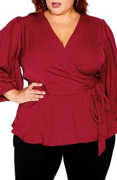 Fall for the silhouette of this wrap top designed with a defining tie belt. 30" length Surplice V-neck Bracelet-length sleeves Lined 100% polyester Hand wash, line dry Imported Ultra Feminine Style, Fashion Promotion, Black Wide Leg Pants, Women Plus Size, Plus Size Top, Blouse Online, Chic Woman, New Tops, City Chic