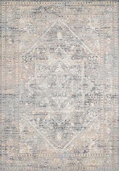 an area rug with grey and beige colors