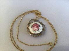 "Antique Art Nouveau Guilloche Locket filled with rubies. The gemstones move freely in the double-sided locket. The precious gems are gorgeous and beautiful quality. I meticulously search the world for the best quality and price. The gold-plated Guilloche round locket is from the early 1900's and a Gorgeous statement piece. It has a diameter of approx. 1 1/8\" and sparkles with rubies! It hangs from a 18\" gold-plate chain that extenders to 30\". It will come to you in a gift box. The Perfect gi Antique Rose Gold Locket Necklace, Antique Adjustable Locket, Antique Enamel Locket Jewelry, Collectible Art Deco Locket Necklace, Art Nouveau Locket, Round Locket, Memory Locket, Locket Pendant Necklace, Round Sapphire