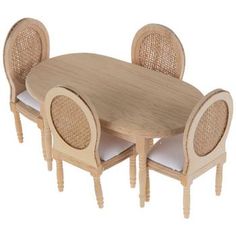 a wooden table with chairs around it and white cushions on the backrests, in front of a white background