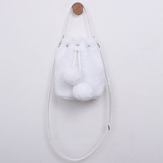 Made from high quality faux shearling. Our snow line is designed for the colder weather and will go great with your winter outfits. miim is a popular South Korean laptop bags, backpacks, and boutique brand. INFO+ Eco friendly faux fur+ Detachable shoulder strap Materials: inner - polyester outer - polyester trim - leather Dimensions: 180x210x120mm Item Weight: 182g SHIPPING: Free shipping from South Korea, estimated 7-14 days to get to you from purchase date. RETURNS: Return address is in USA so Trendy Fluffy Faux Fur Shoulder Bag, Trendy Faux Fur Shoulder Bag With Faux Fur Lining, Trendy Winter Shoulder Bag With Faux Fur Lining, Trendy White Shoulder Bag For Winter, Trendy Winter Bag With Faux Fur Trim, Trendy Winter Bags With Faux Fur Trim, Winter Faux Fur Bag With Plush Lining, Winter Bag With Faux Fur Lining, Winter Faux Fur Shoulder Bag With Plush Lining