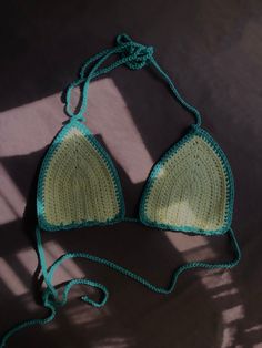 Size small light yellow and green handmade crochet bikini top great for summer! can be worn as a bikini top, bralette, or even a festival top not recommend as your average swimwear but great for tanning or a quick dip in the pool🌞 made with an adjustable strap Sizing ~ cup width A-XS (5"-5 1/2") B-S (6"-6 1/2") C-M (7"-7 1/2") D-L (8"-8 1/2") Handmade Green Crochet Top For Festival, Green Crochet Top For Beachwear, Handmade Yellow Crochet Top For Beach, Yellow Crochet Beach Tops, Green Crochet Summer Swimwear, Quick Dip, Festival Tops, In The Pool, Small Light