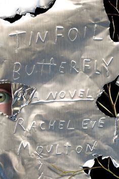 a piece of tin foil with writing on it that says, tinfoil butterfly and rachel eve mollion