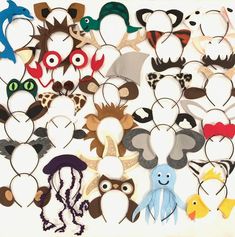 a group of different types of animal masks on a white background, with one being cut out