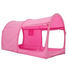 a pink tent with the door open to show it's interior and side walls