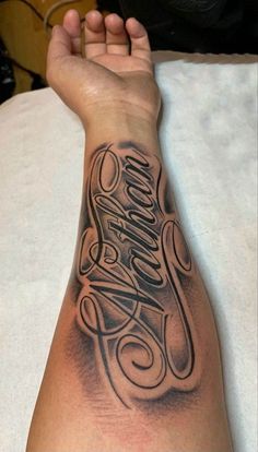 a person with a tattoo on their arm