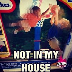 an advertisement for a toy basketball game with a man dunking the ball in it