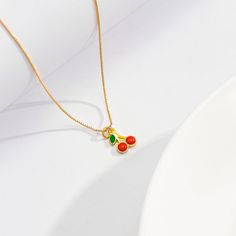 Description:Dainty Enamel Cherry Pendant Box Chain Choker NecklaceSpecification:Length: 15.7 " + 2.7" extWeight: 0.08 oz/pieceMaterial: Alloy metal. Copper. EnamelColor: GoldFeatures & Details:Cherry is popular for women and girls. the classical cherry charm with gold material make it never out of date. This sparkling. stylish and elegant cherry pendant necklace is a smart choice of gift for women and girls.This enamel cherry pendant box chain choker necklace is made of environmental friendly materials. which is solid. durable. lightweight and very comfortable and healthy for daily wear. It is the best gift to express your love for friends. girlfriend. wife and your beloved persons. suitable for wedding. holiday. birthday. party. ceremony as christmas gifts. thanksgiving gifts. mother's da Enamel Chain Necklace For Gift, Enamel Chain Jewelry As A Gift, Enamel Chain Jewelry For Gifts, Enamel Chain Jewelry As Gift, Gold Enamel Necklace With Chain, Gold Enamel Necklace With Delicate Chain, Dainty Enamel Necklace As A Gift, Alloy Charm Necklace As Gift, Dainty Plated Chain Necklace For Gift