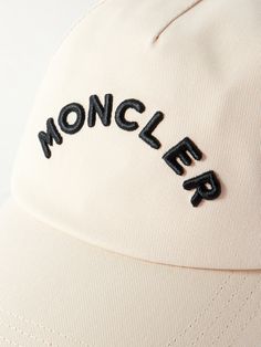 Moncler's baseball cap is embroidered with the arched brand name in thick black lettering across the front. Designed with an internal brow band for comfort, it's made from hard-wearing cotton-gabardine and appliquéd with a signature felt logo above the VECLRO®-fastening back tab. Cap For Men, Embroidered Leather, Baseball Caps Mens, Embroidered Baseball Caps, Logo Embroidered, Brand Names, Linen Blend, Hats For Men, Baseball Cap