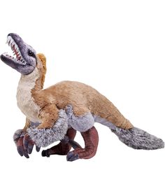 a stuffed animal that looks like a dinosaur