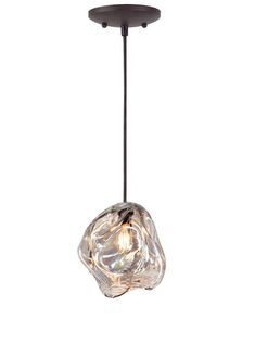 a light that is hanging from a ceiling fixture with a glass ball in the middle