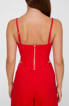 Internal boning and supportive seams lend structure to this subtly cropped corset top. 9 1/2" length (size 8) Exclusive retailer Exposed back-zip closure Deep V-neck Adjustable straps 100% polyester Hand wash, line dry Imported Cropped Corset Top, Cropped Corset, Red Fits, Fabric Gifts, Nordstrom Store, Free Fabric, Corset Top, Deep V Neck, New Shoes