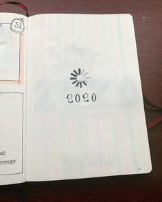 an open notebook with the date and year on it