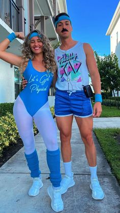 a man and woman are dressed up in bodysuits while posing for the camera