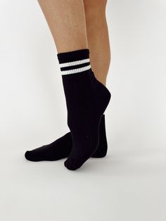 Our Varsity Socks are knit with ribbed and striped styling for a comfortable, casual, and athleisure look. With an ankle-length design for a trendy finish, these varsity socks bring the perfect combination of fashion and function. Winter Sporty Socks With Ribbed Cuffs, Sporty Winter Socks With Ribbed Cuffs, Striped Stretch Socks For Winter, Stretch Striped Socks For Winter, Winter Striped Stretch Socks, Trendy Sports Socks For Spring, Sporty Black Socks For Spring, Sporty Stretch Cotton Socks, Trendy Black Sports Socks