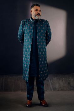 Teal green floral jamawar embroidered front open sherwani with dabka highlighting. Paired with matching angrakha kurta and tapered trousers.
Component: 3
Pattern: Embroidered
Type Of Work: Floral
Neckline: Open
Sleeve Type: Long
Fabric: Linen Silk
Color: Green
Other Details: 
Floral embroidery
Occasion: Groom,Wedding - Aza Fashions Open Sherwani, Jatin Malik, Embroidered Sherwani, Luxury Footwear, Open Sleeve, Tapered Trousers, Custom Tailoring, Embroidered Silk, Handmade Shoes